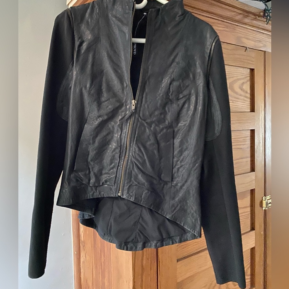 Black Leather Jacket with High Collar and Asymmetrical Hem